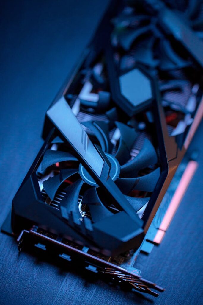 pexels-photo-7859350 Detailed view of a high-performance graphics card with cooling fans, ideal for gaming PCs.